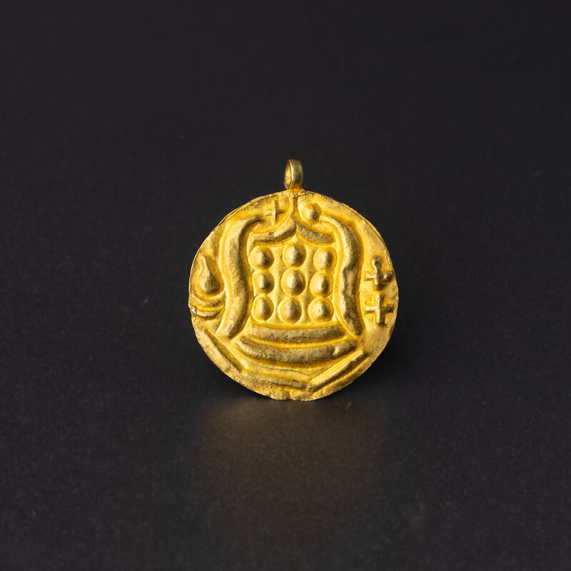 Disc Pendant with a Nine-Bossed Emblem