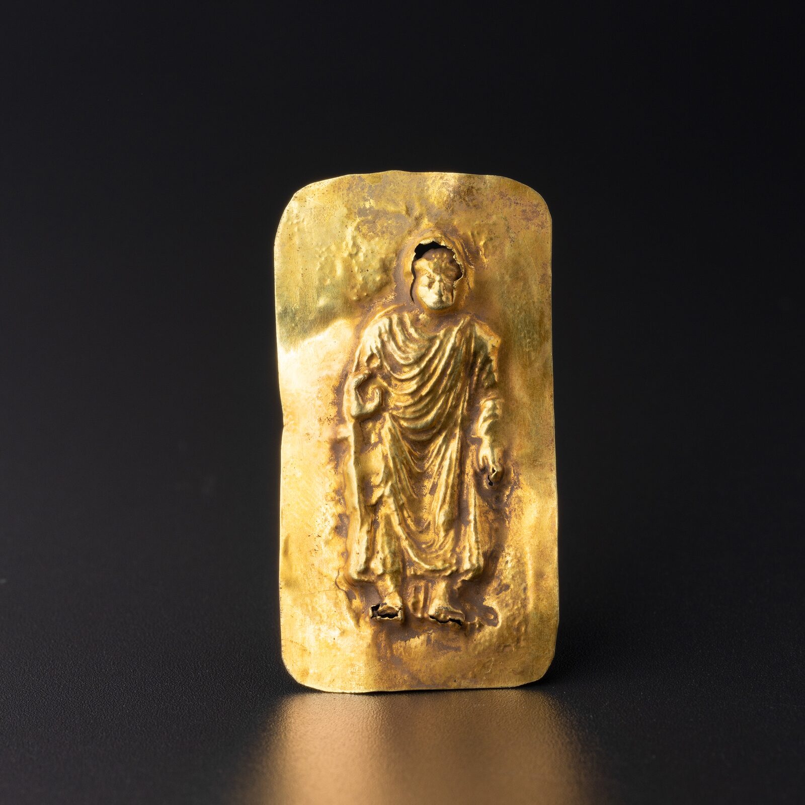 Small Plaque with a Standing Buddha