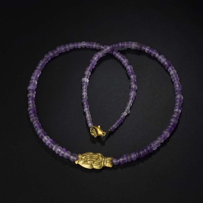 Necklace of Purple Beads with a Gold Centre Bead