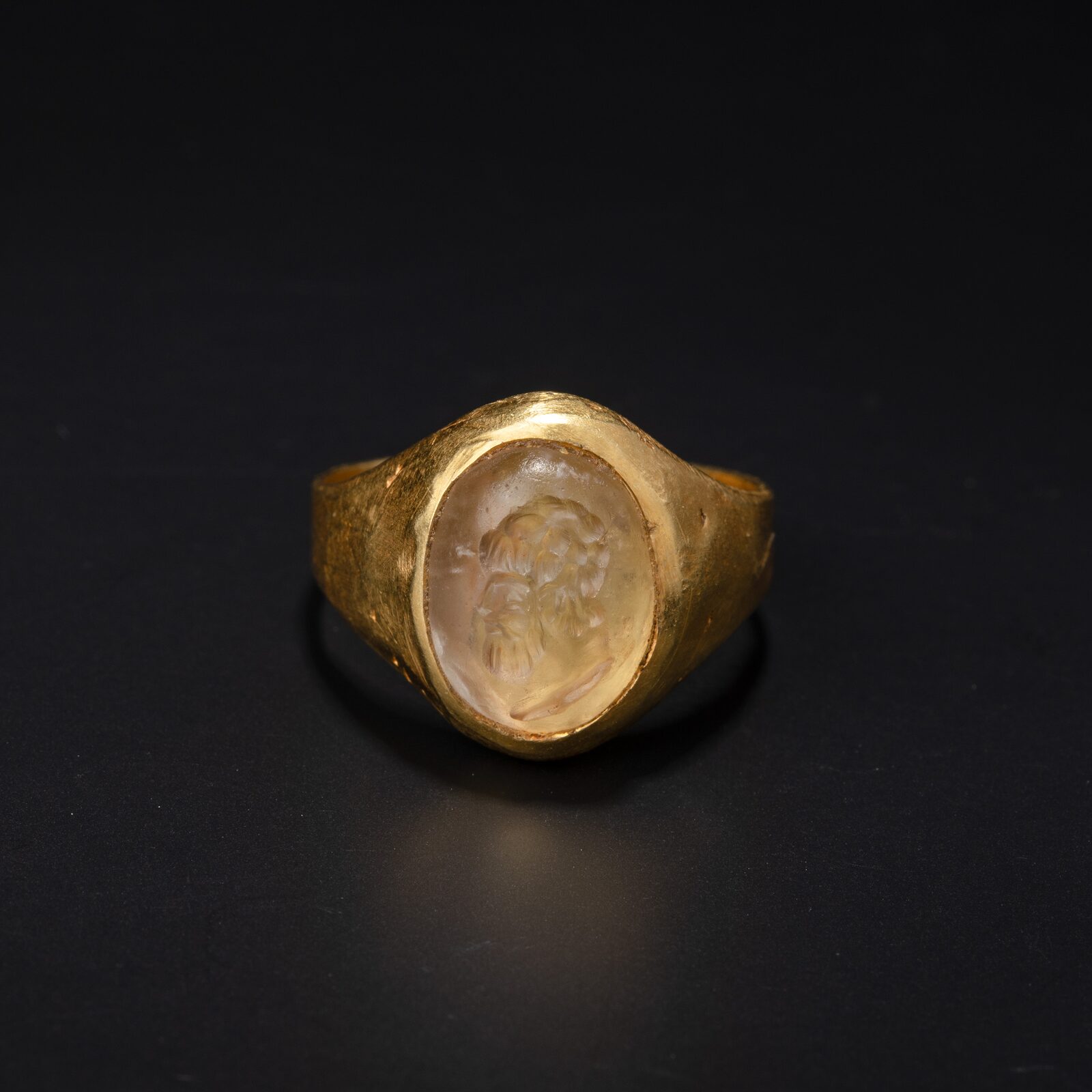 Signet Ring with a Bearded Head in a Clear Stone